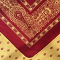 Square Jacquard tablecloth "Vaucluse" red and yellow, by Tissus Toselli