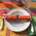 Round coated Jacquard tablecloth "Maussane" Orange and turquoise
