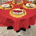Coated cotton round tablecloth "Calisson" red and yellow by Tissus Toselli