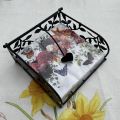 Paper napkins holder, metal and foliage