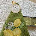 Embrodery round hand towel "Lemons" green
