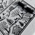 Jacquard placemat "Lausanne" white and black from Tissus Toselli in Nice