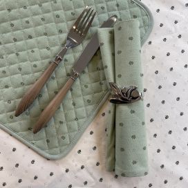 Coated quilted placemat in cotton "Calissons" green and beige
