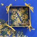 Coated cotton bread basket with laces "Mimosas" blue by Tissus Toselli