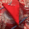Serviette de table en coton "Coucke" uni rouge cerise