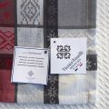 Rectangular Jacquard tablecloth "Vars" grey and red by Tissus Toselli