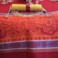 Square Jacquard tablecloth "Vaucluse" red and orange, by Tissus Toselli