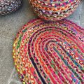 Colored oval jute and cotton rug