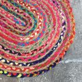 Colored oval jute and cotton rug