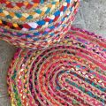 Colored oval jute and cotton rug